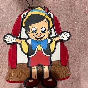 Disney Pinocchio Doll Backpack with Red and Blue Highlights